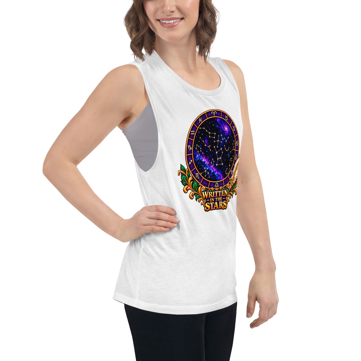 Written In The Stars astrology design, a zodiac wheel of constellations and a galaxy framed by gold scrollwork and a feather quill, on a white ladies muscle tank, right front view