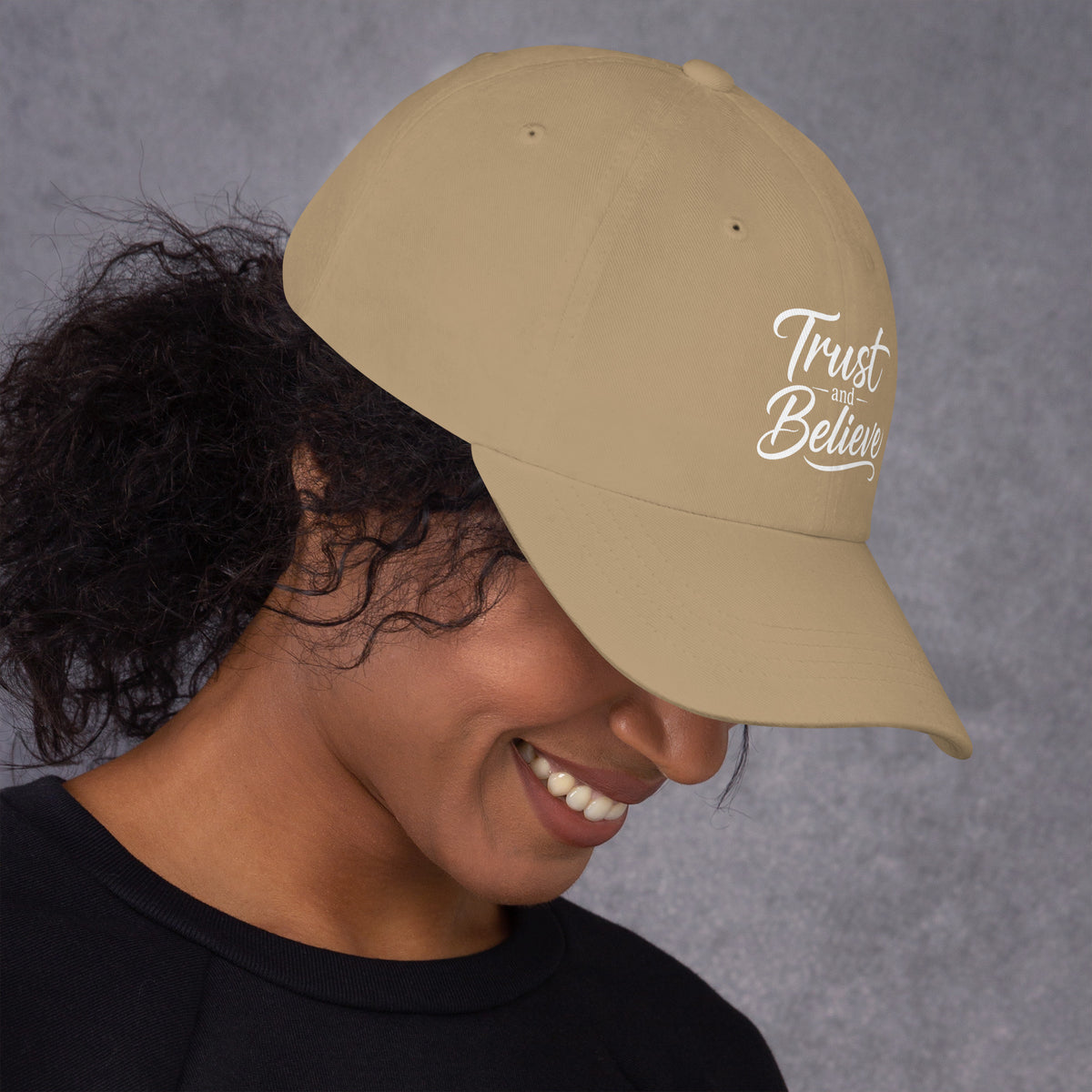 Trust and Believe design, on a khaki dad hat, right side view