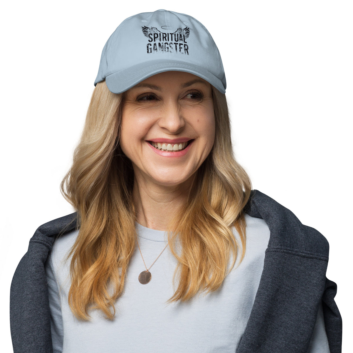 Spiritual Gangster design in black lettering, with angel wings and a halo, on a light blue dad hat, front view