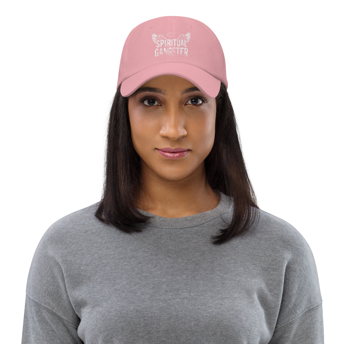 Spiritual Gangster design with angel wings and a halo, on a pink dad hat, front view