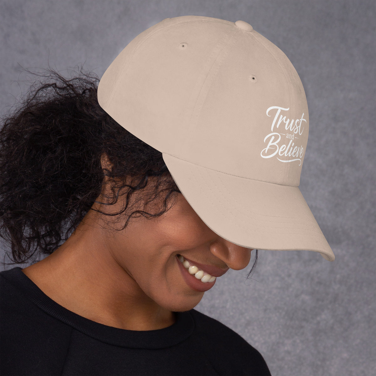 Trust and Believe design, on a stone dad hat, right side view