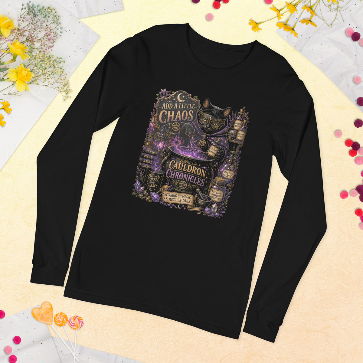 Add A Little Chaos whimsigoth design, a masked cat and a bubbling cauldron, on a black unisex long sleeve tee, front view