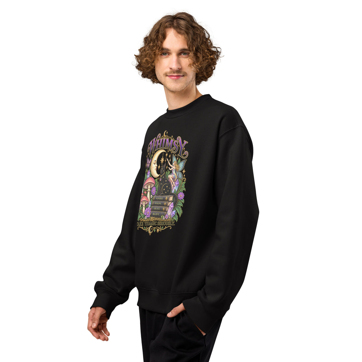 Whimsy, Take Your Magic Seriously design, on a black oversized heavyweight sweatshirt, angled left front view