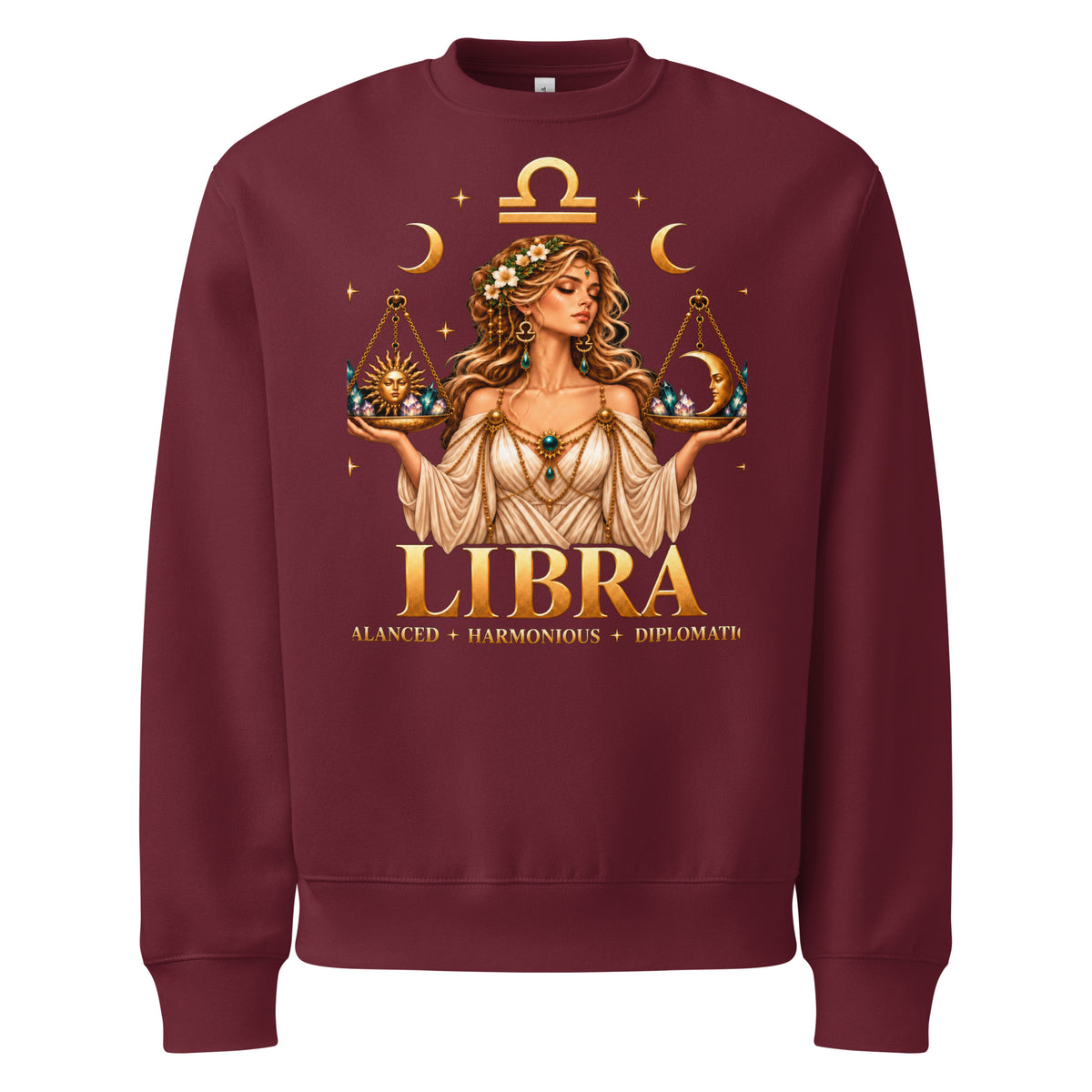 Libra zodiac oversized sweatshirt in maroon, front: a woman holding golden scales in a night sky of gold stars with the Libra glyph