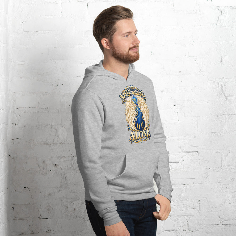 I Am Never Walking Alone design, cream angel wings framing a starry path with gold footprints, on an athletic heather pullover hoodie worn by a model, angled to the right