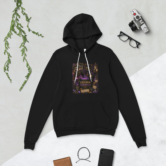 Add A Little Chaos whimsigoth design, a masked cat and a bubbling cauldron, on a black unisex pullover hoodie, front view