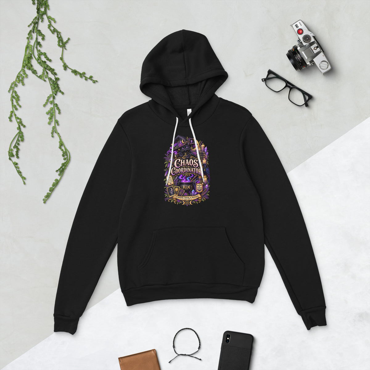 Chaos Coordinator whimsigoth design, a witchy black cat in a pointed hat, on a black unisex pullover hoodie, front view