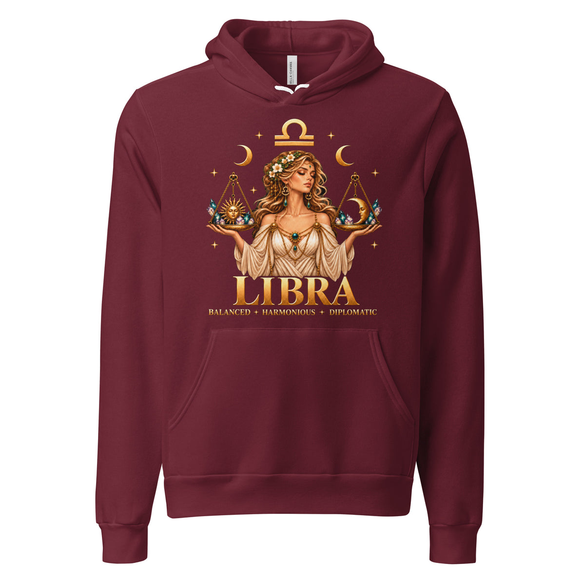 Libra zodiac hoodie in maroon, front: a woman holding golden scales in a night sky of gold stars with the Libra glyph