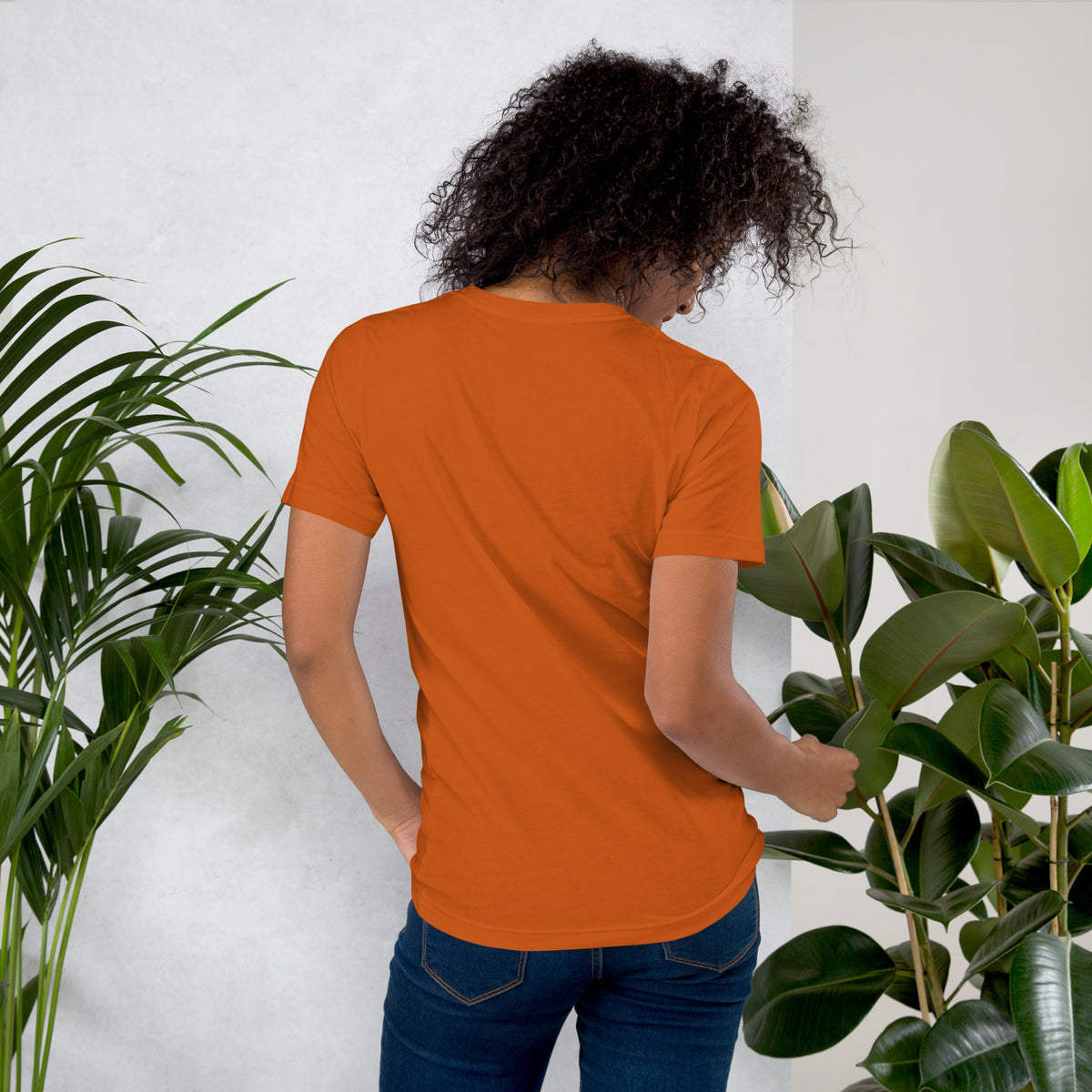 Own Your Grounded Energy design, an ornate tree with gold leaves and crystals in its roots, on an autumn unisex t-shirt, back view