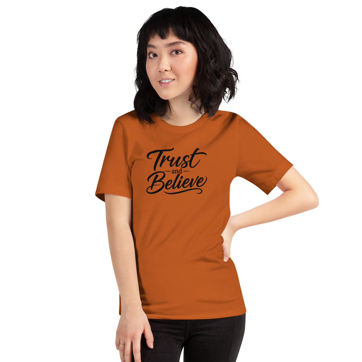Trust and Believe design in black lettering, on an autumn unisex t-shirt, front view