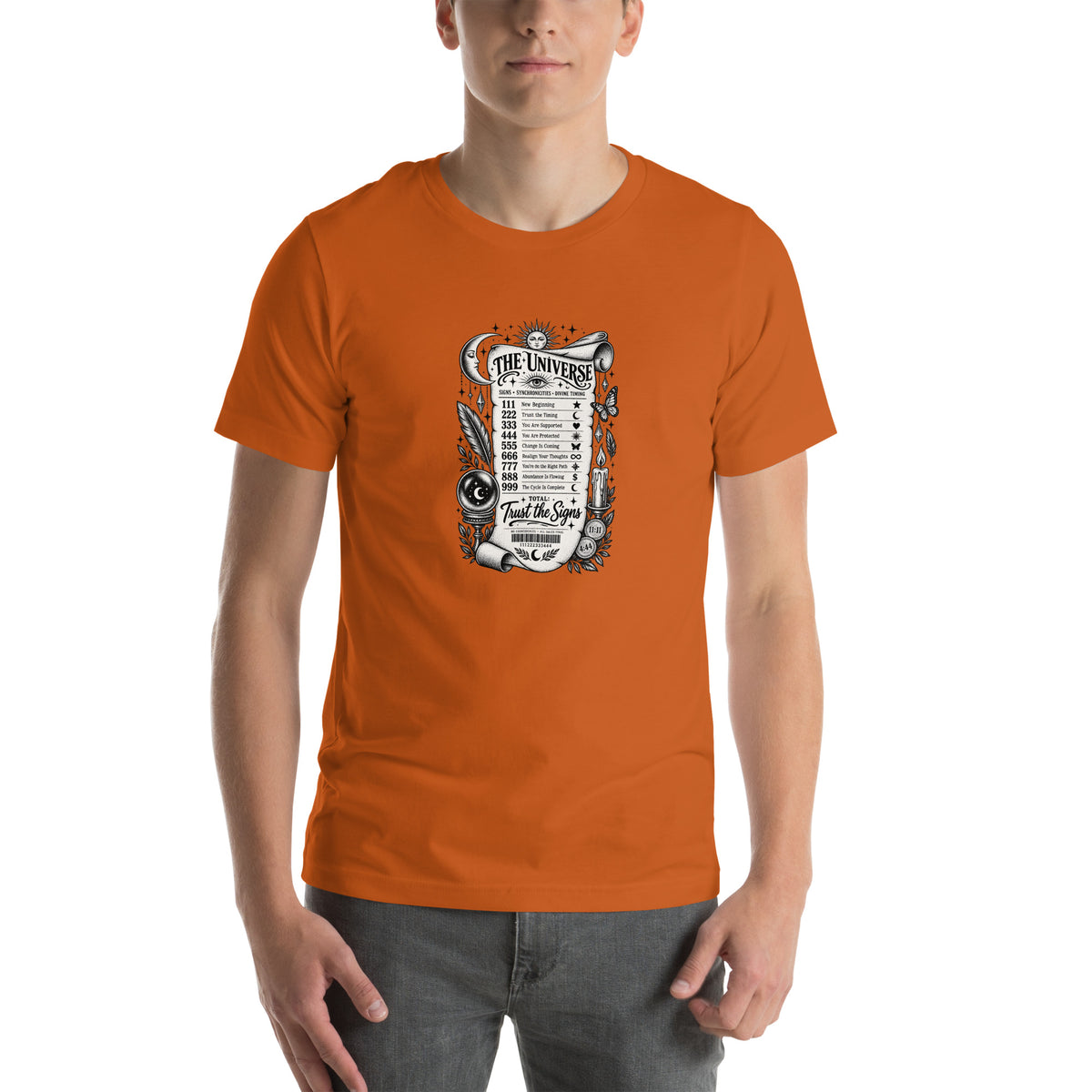 Trust the Signs design, a receipt from the Universe listing the angel numbers and their meanings, with a crystal ball and a candle, on an autumn unisex t-shirt, front view