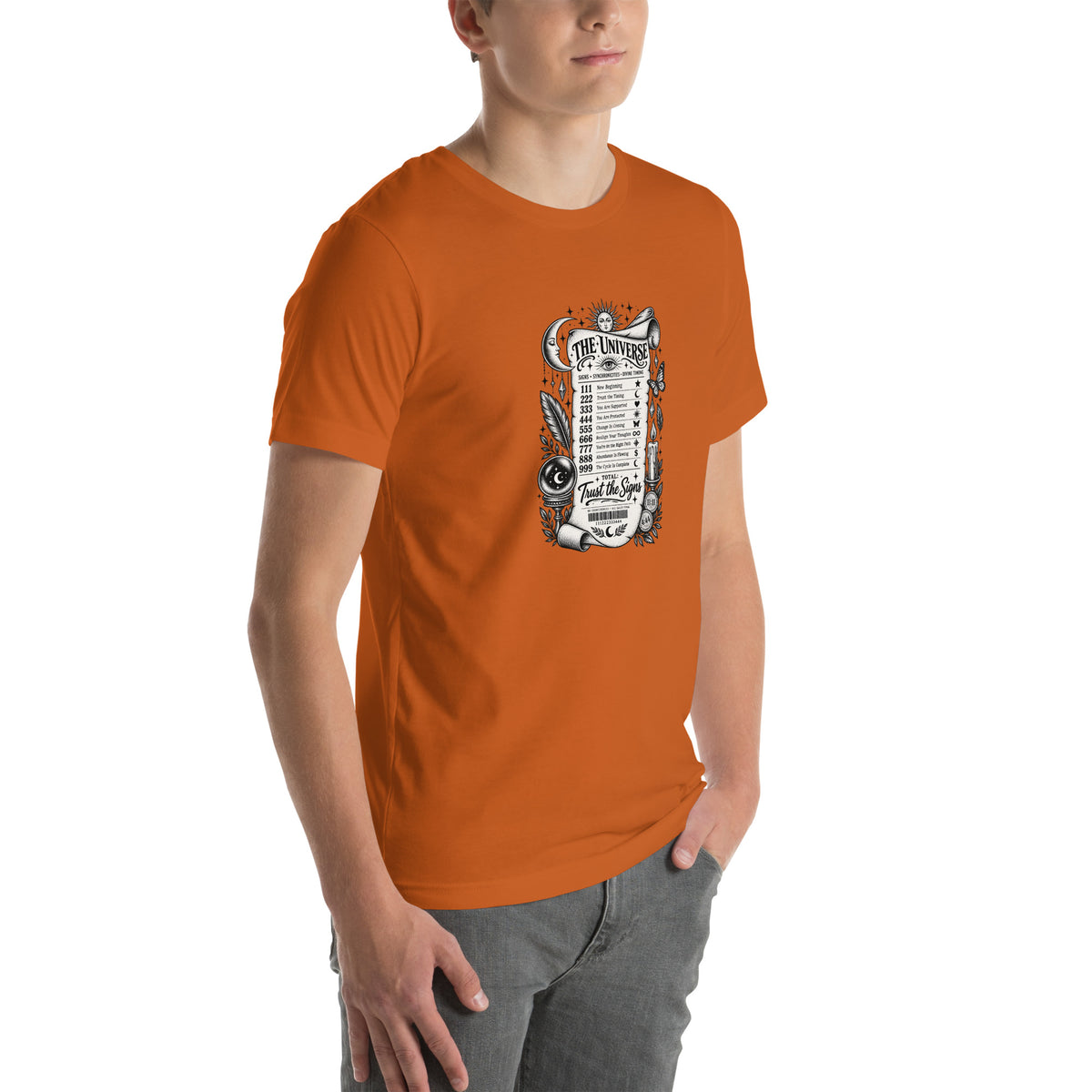 Trust the Signs design, a receipt from the Universe listing the angel numbers and their meanings, with a crystal ball and a candle, on an autumn unisex t-shirt, angled right front view