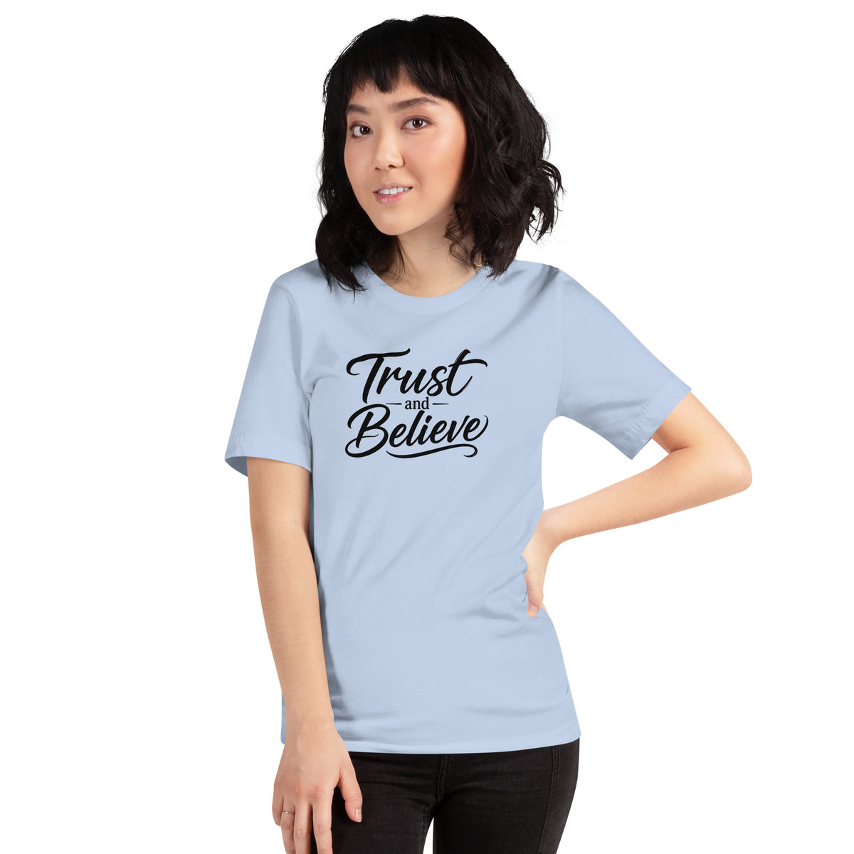 Trust and Believe design in black lettering, on a baby blue unisex t-shirt, front view