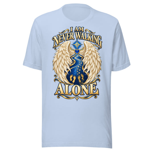 I Am Never Walking Alone design, cream angel wings framing a starry path with two sets of gold footprints and a blue gem heart, on a baby blue unisex t-shirt, front view