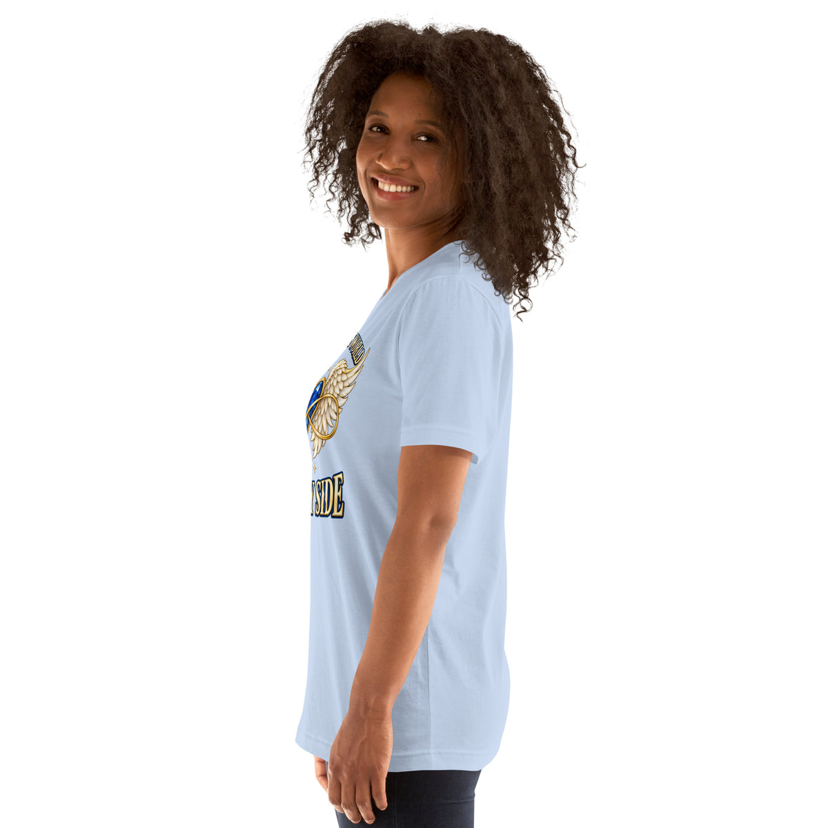 You Left This World Not My Side design, a blue gem heart with cream angel wings and a gold infinity ribbon under gold lettering, on a baby blue unisex t-shirt worn by a model, left side view