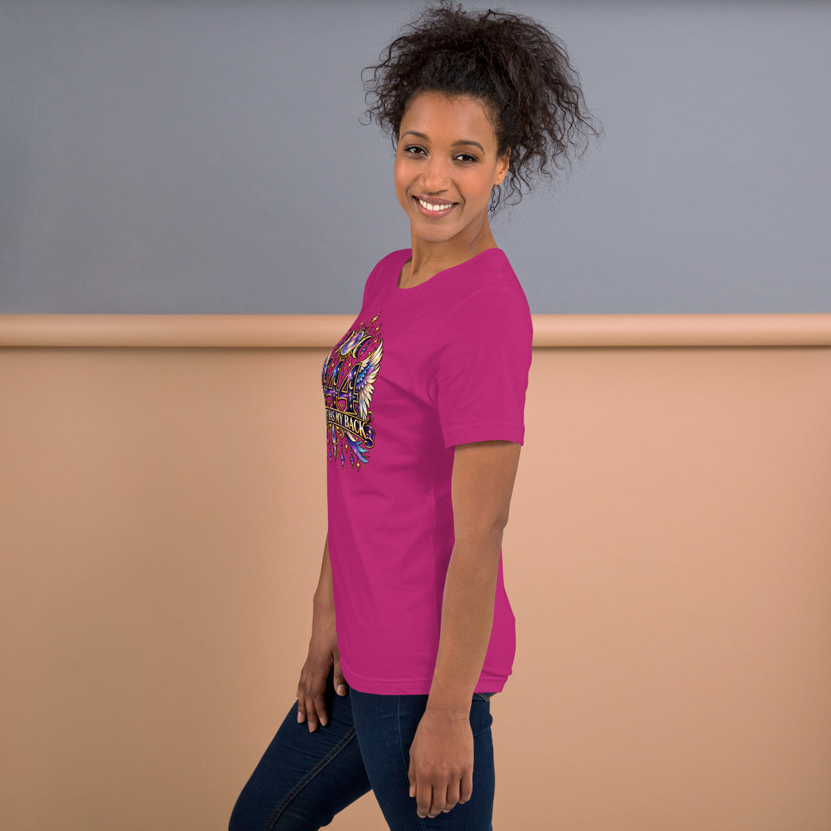444 Spirit Has My Back angel number design, angel wings flanking the number beneath a galaxy orb and crescent moons, on a berry unisex t-shirt, left side view