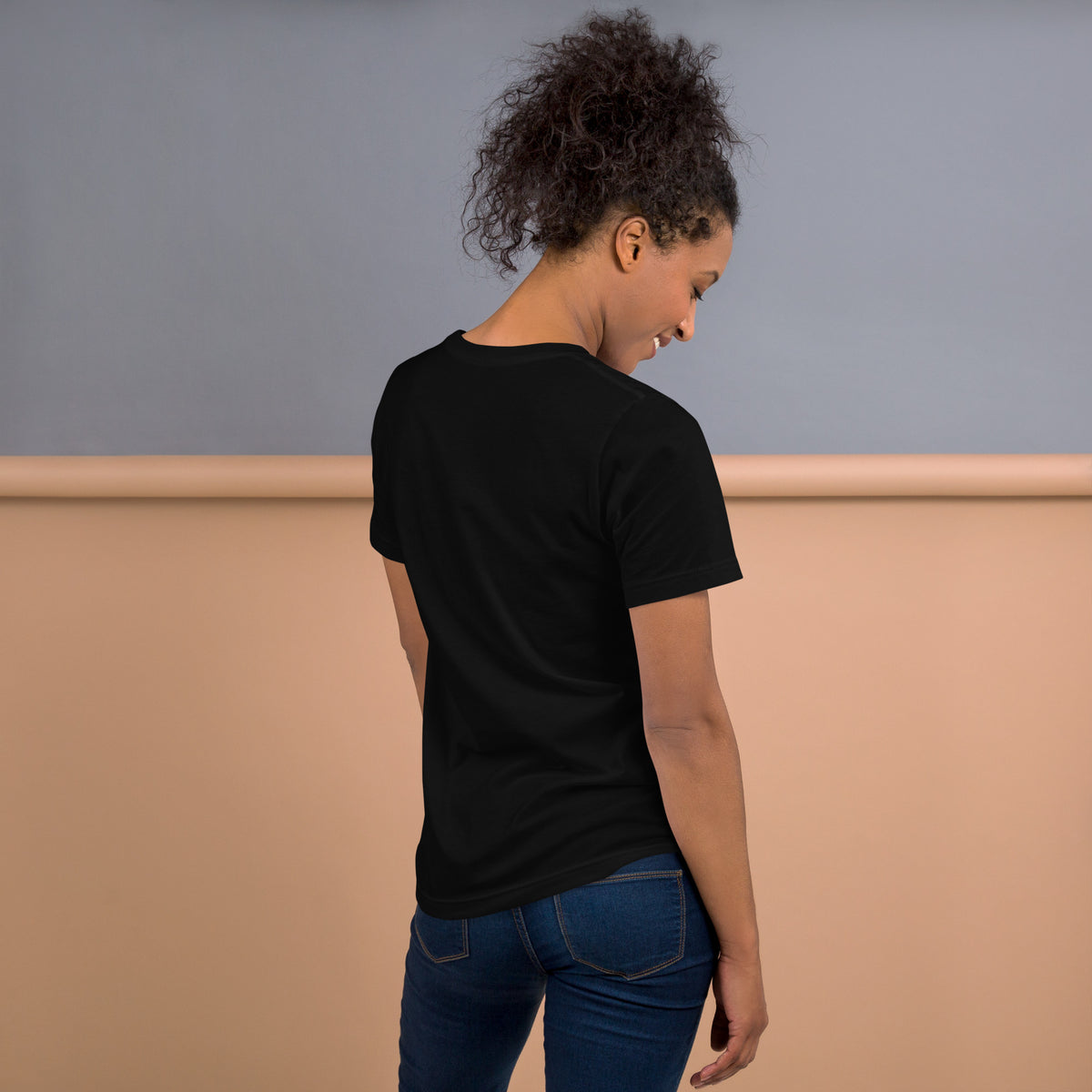444 Spirit Has My Back angel number design, angel wings flanking the number beneath a galaxy orb and crescent moons, on a black unisex t-shirt, back view