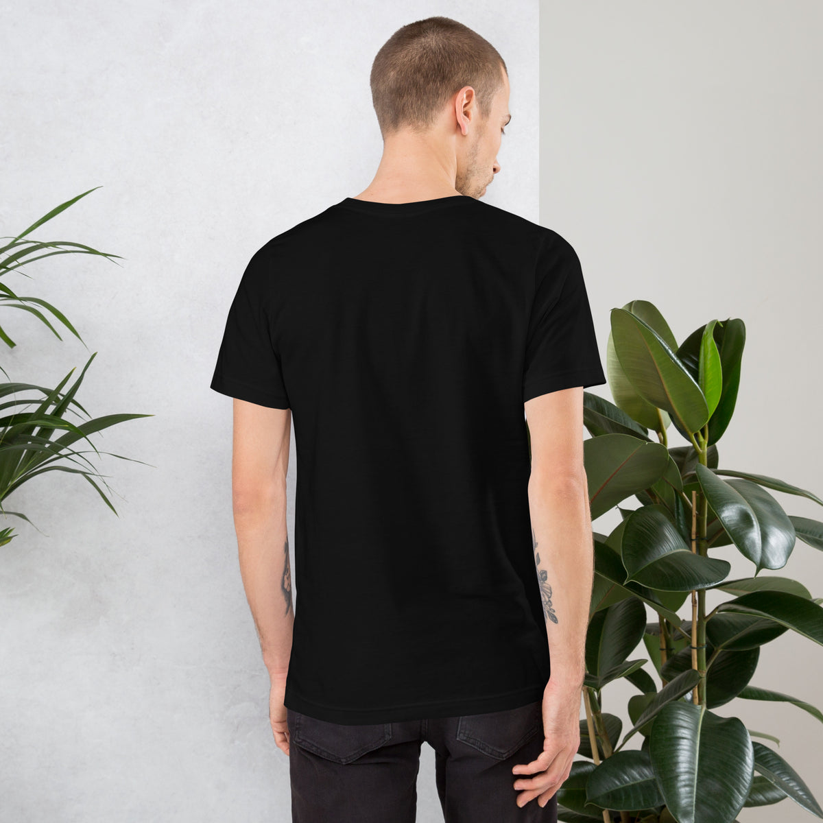 11:11 angel number design, the number set in plain white type above Notice, Align, Receive, on a black unisex t-shirt, back view