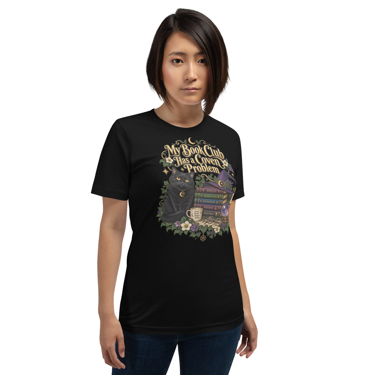 My Book Club Has A Coven Problem dark academia design, a witchy black cat and a stack of spellbooks, on a black unisex t-shirt, front view