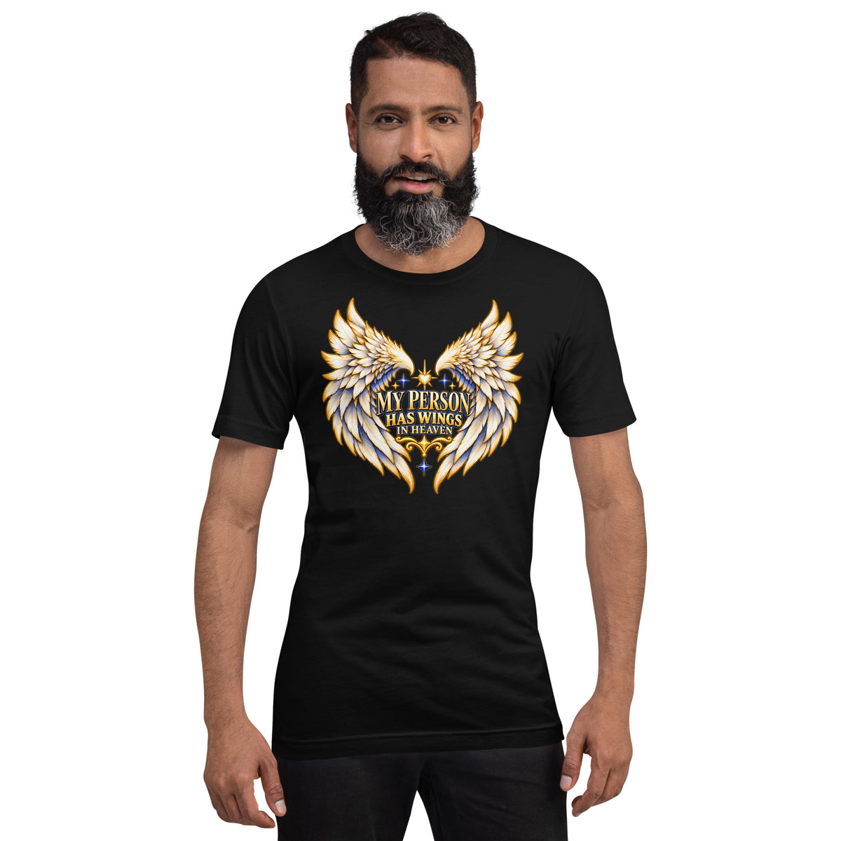 My Person Has Wings In Heaven design, gold and white angel wings curving into a heart around gold lettering with blue star sparkles, on a black unisex t-shirt worn by a model, front view