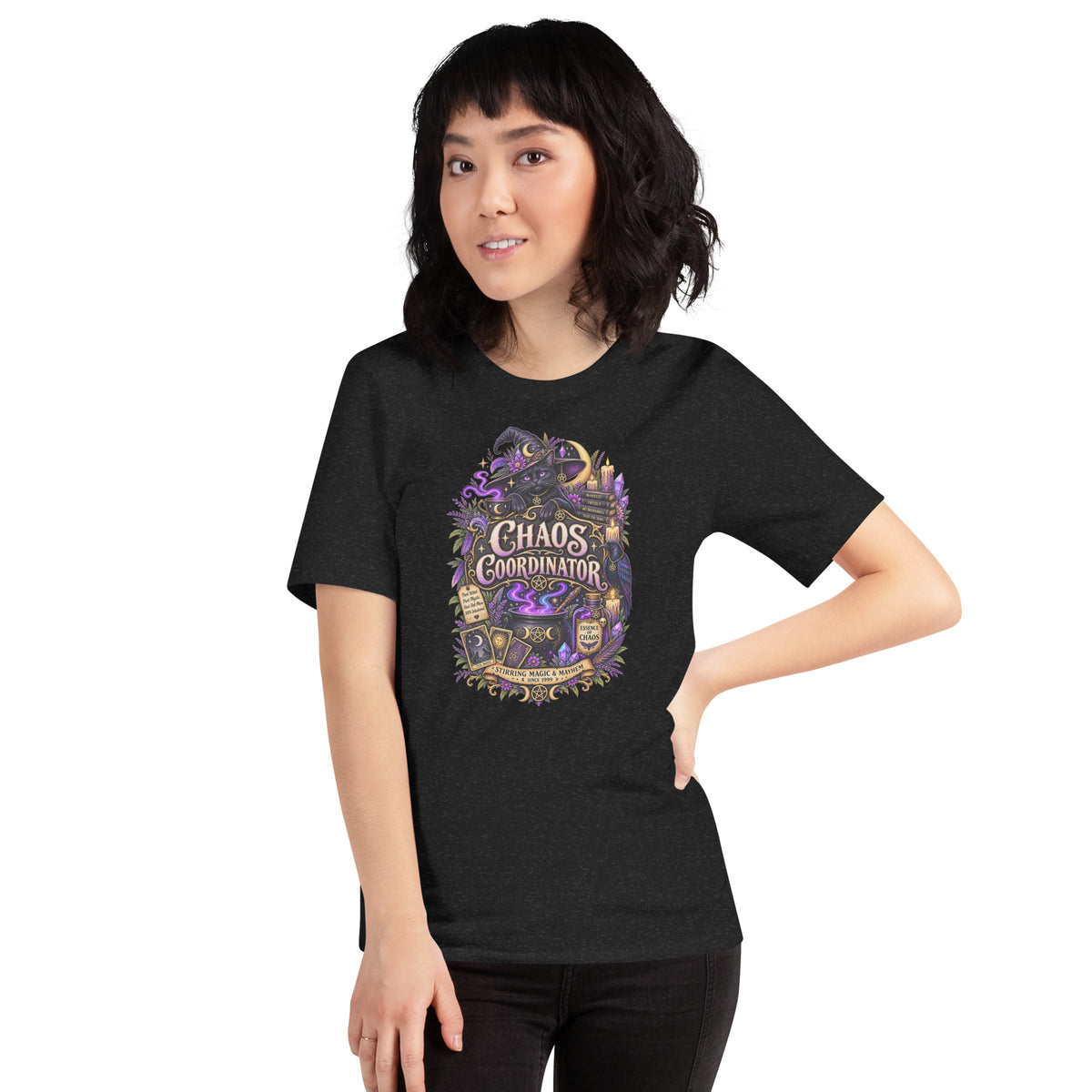 Chaos Coordinator whimsigoth design, a witchy black cat in a pointed hat, on a black heather unisex t-shirt, front view