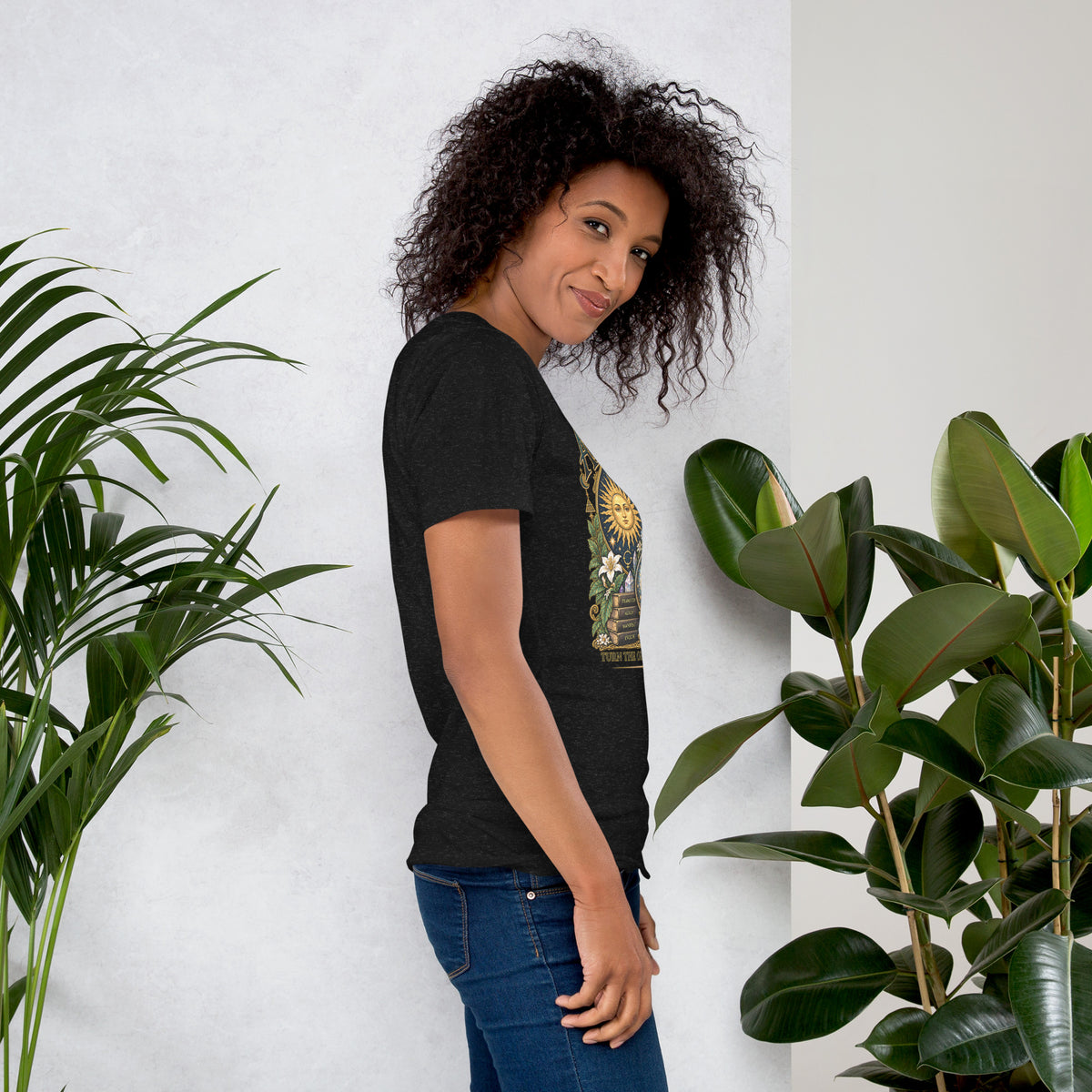 Alchemy, Turn the Ordinary Into Magic design, on a black heather unisex t-shirt, right side view
