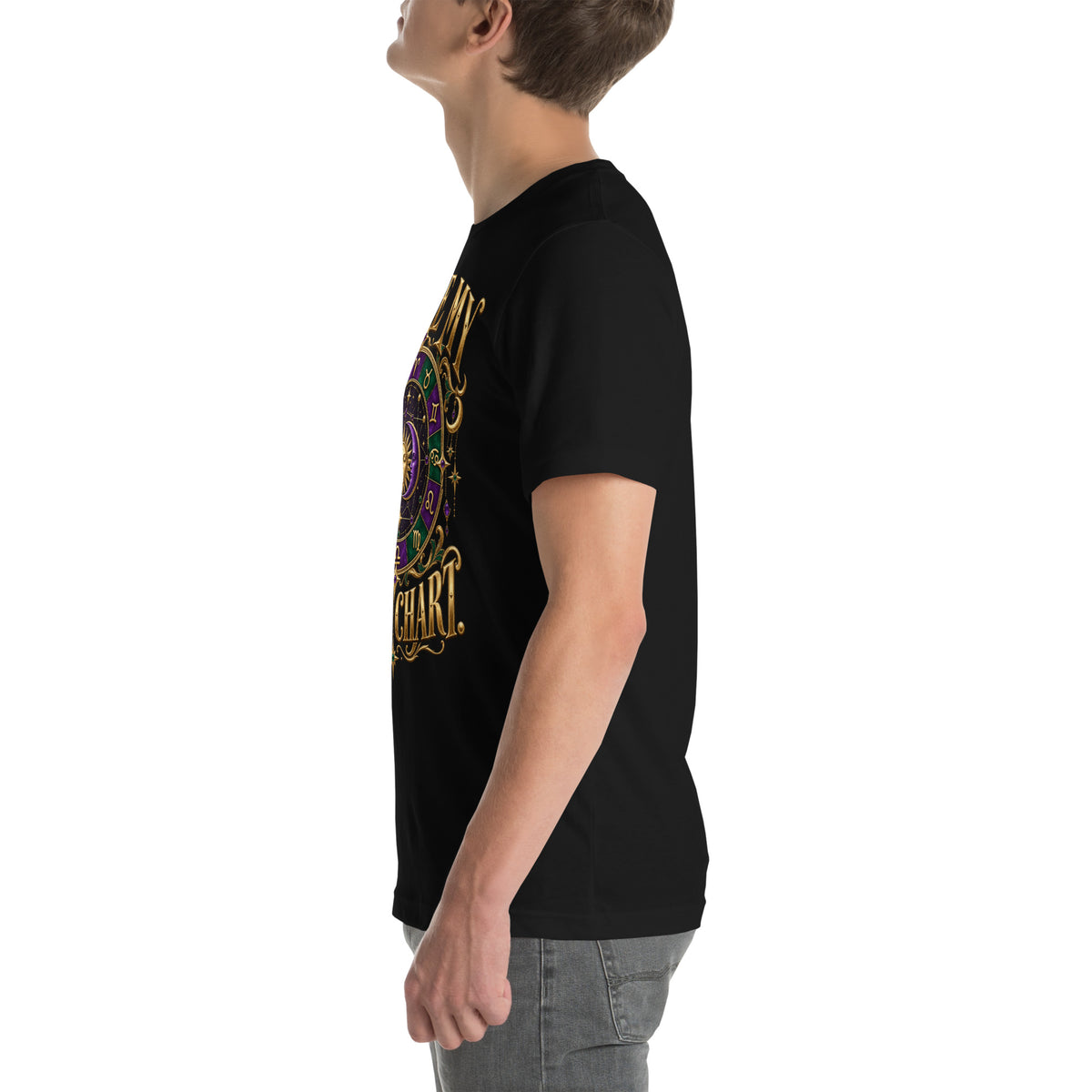 Blame My Birth Chart astrology design, a purple and green zodiac wheel with a gold sun face and crescent moon at its center, hung with gold ornaments, on a black unisex t-shirt, left view