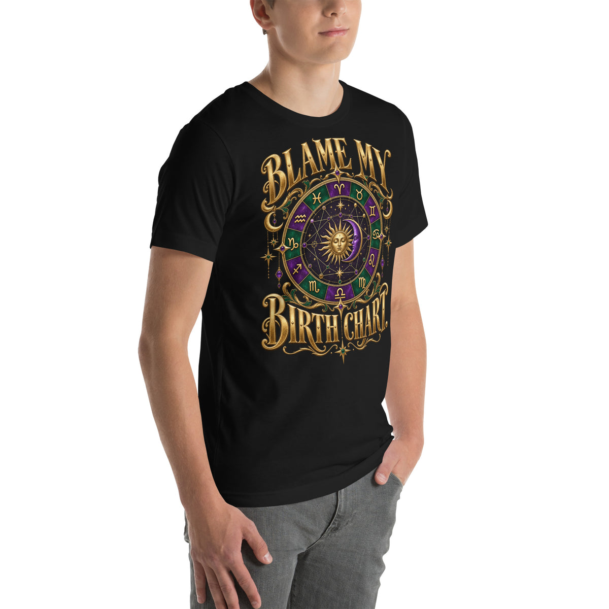 Blame My Birth Chart astrology design, a purple and green zodiac wheel with a gold sun face and crescent moon at its center, hung with gold ornaments, on a black unisex t-shirt, right front view