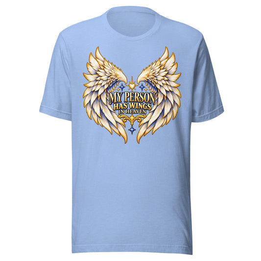 My Person Has Wings In Heaven design, gold and white angel wings curving into a heart around gold lettering with blue star sparkles, on a heather Carolina blue unisex t-shirt, front view