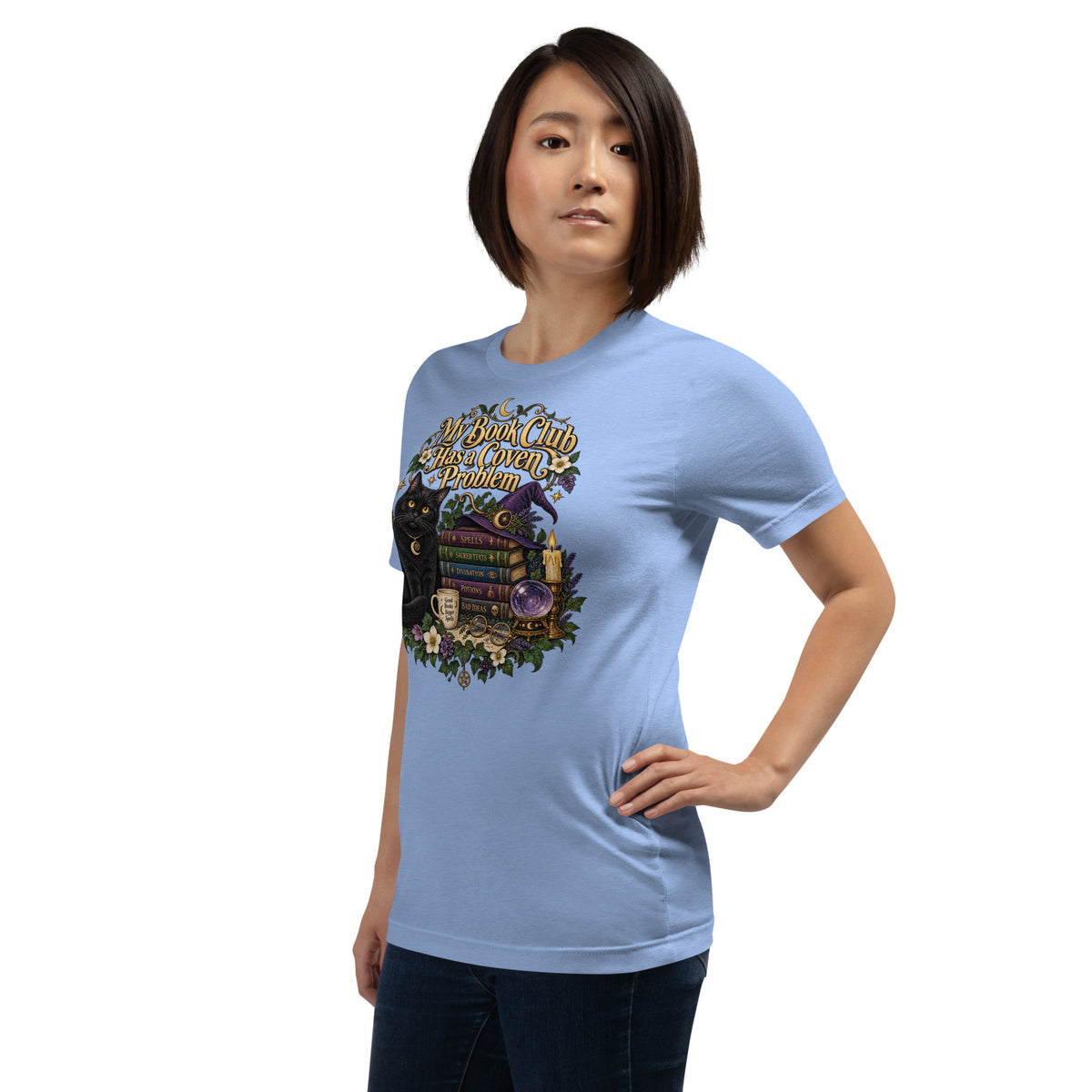 My Book Club Has A Coven Problem dark academia design, a witchy black cat and a stack of spellbooks, on a heather carolina blue unisex t-shirt, left front view