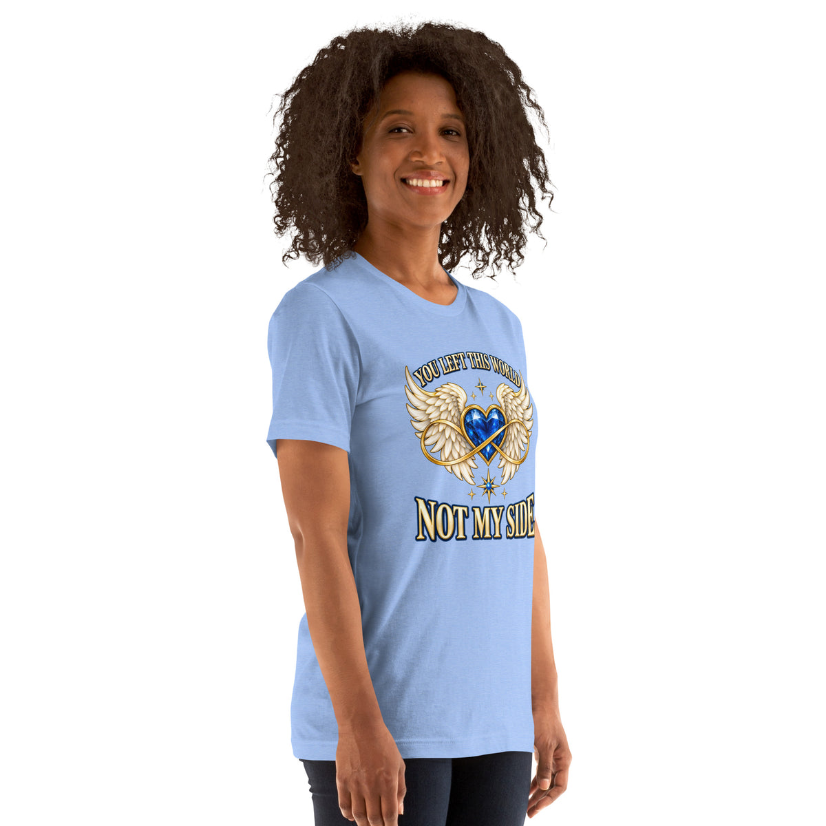 You Left This World Not My Side design, a blue gem heart with cream angel wings and a gold infinity ribbon under gold lettering, on a heather Carolina blue unisex t-shirt worn by a model, angled to the right