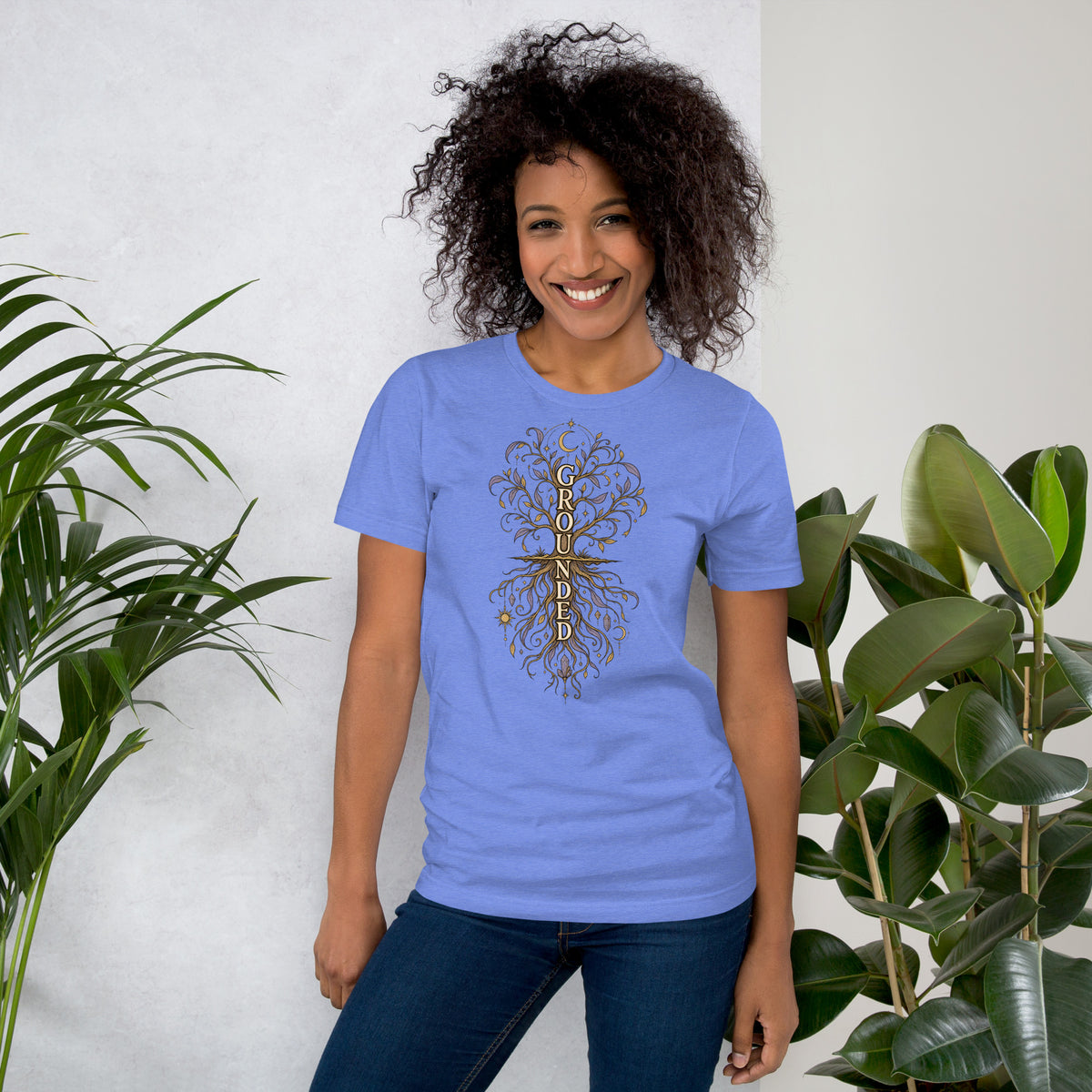 Own Your Grounded Energy design, an ornate tree with gold leaves and crystals in its roots, on a heather columbia blue unisex t-shirt, front view