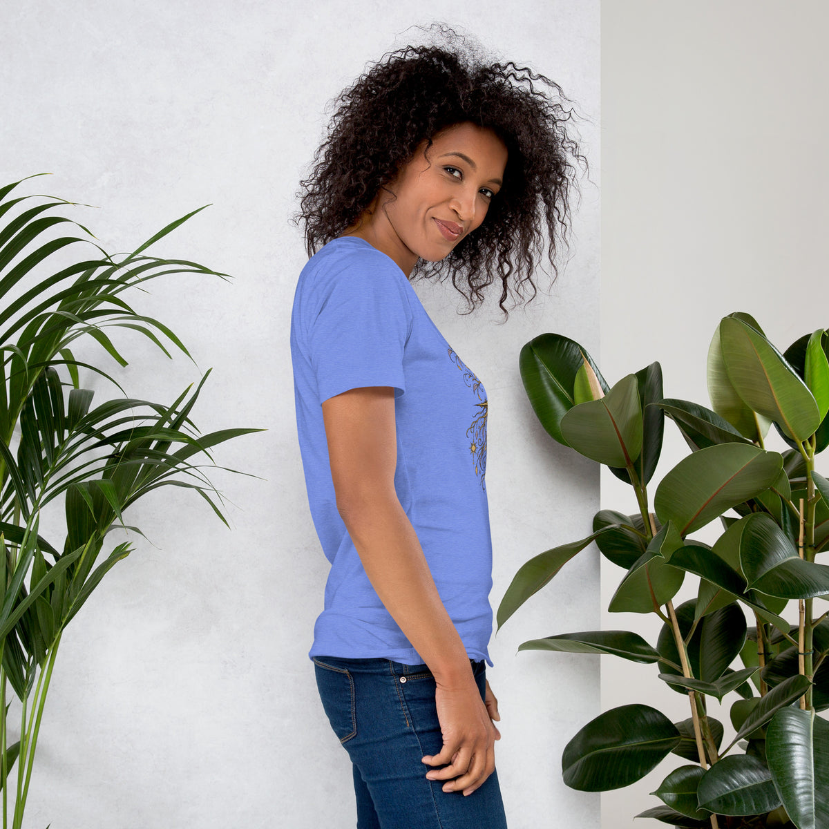 Own Your Grounded Energy design, an ornate tree with gold leaves and crystals in its roots, on a heather columbia blue unisex t-shirt, right side view