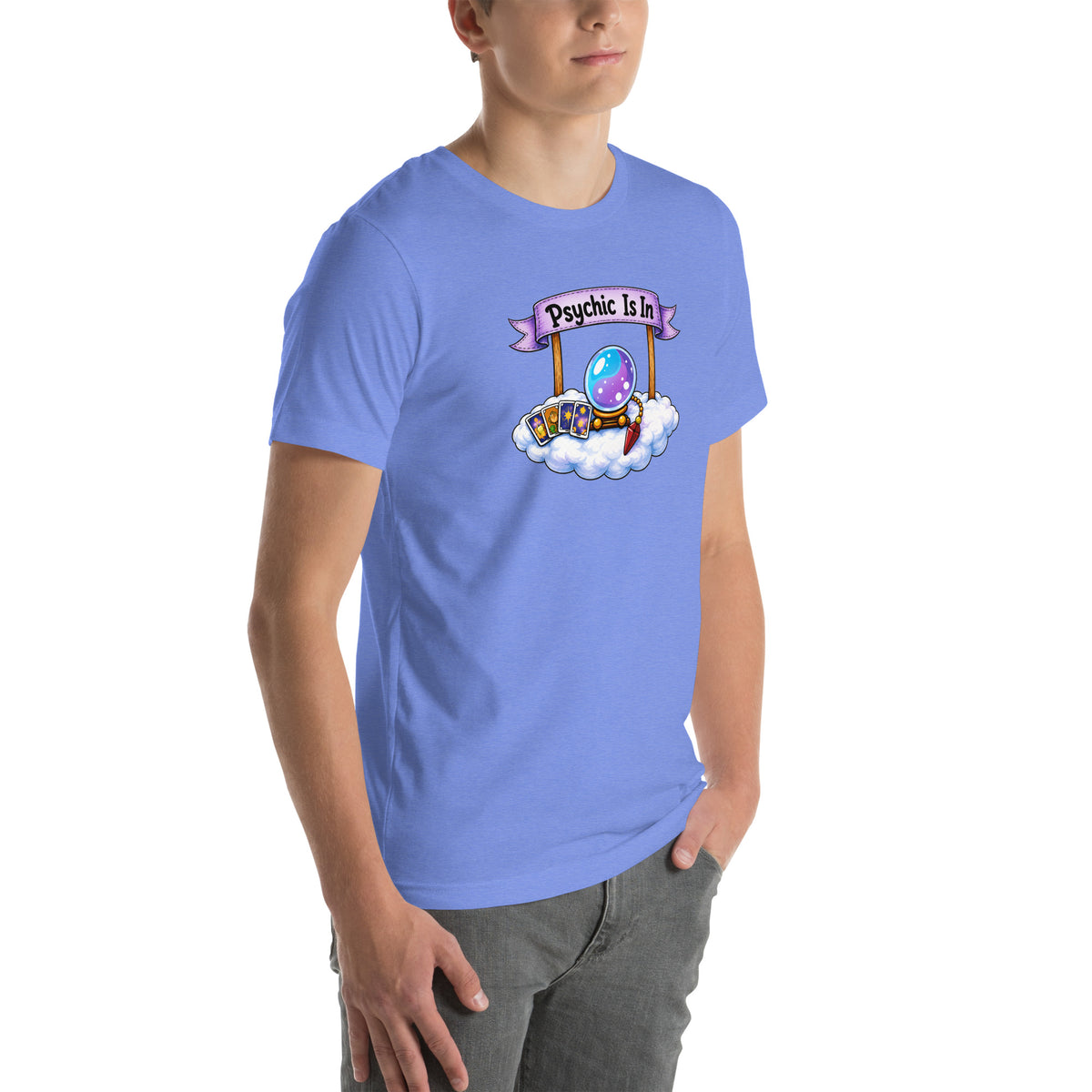 Psychic Is In design, playful floating clouds beneath a banner that reads Psychic Is Open for Business, on a heather columbia blue unisex t-shirt, angled right front view