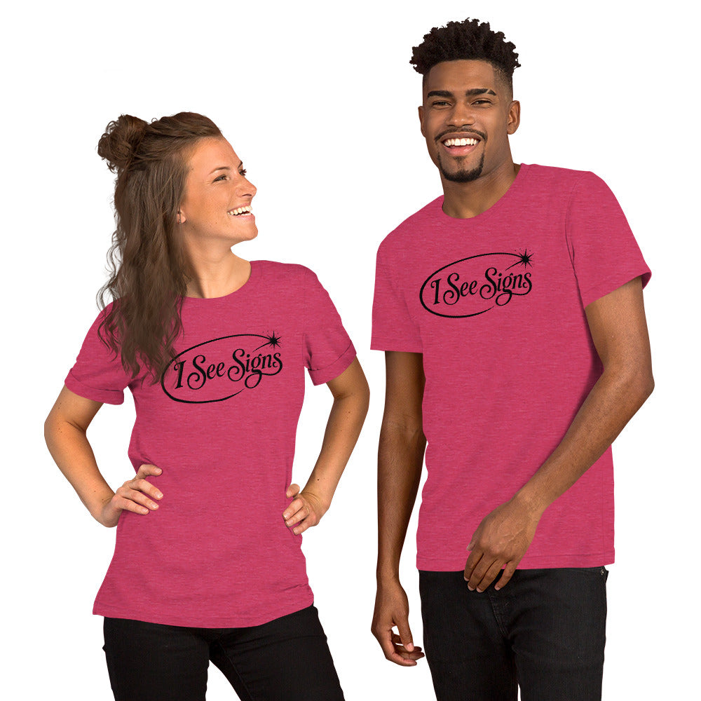 I See Signs design, the words set in black script inside a thin oval with a four-pointed star, on a heather raspberry unisex t-shirt, front view