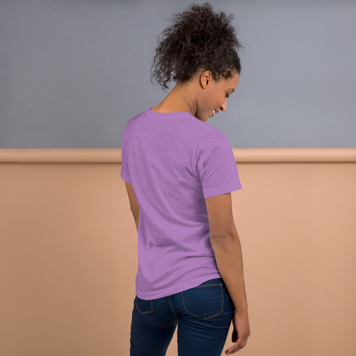 A Little Herbal Magic design, on a heather team purple unisex t-shirt, plain back view with no design