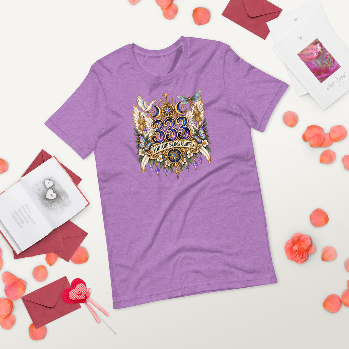 333 You Are Being Guided angel number design, a white dove, angel wings, a dragonfly and a compass rose, on a heather team purple unisex t-shirt, front view, alternate shot