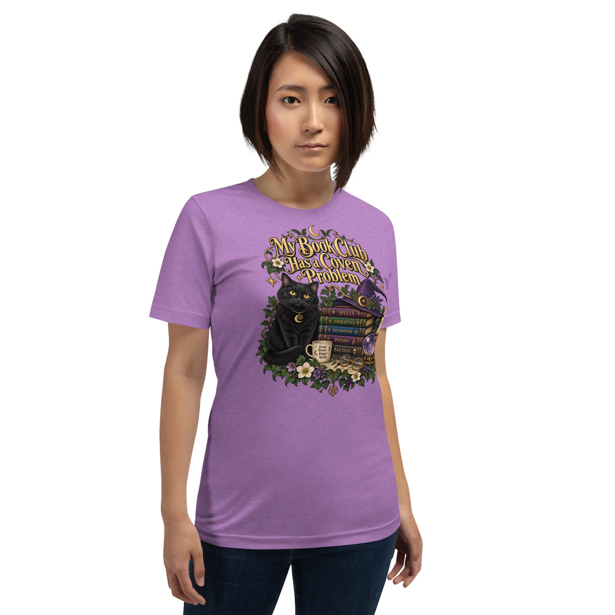 My Book Club Has A Coven Problem dark academia design, a witchy black cat and a stack of spellbooks, on a heather team purple unisex t-shirt, front view