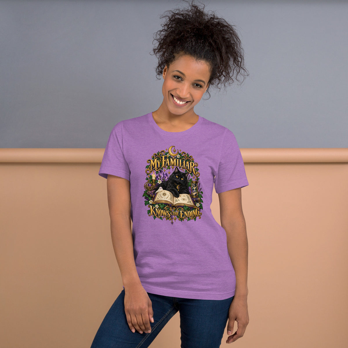 Black cat familiar on a grimoire, mystical design on a heather team purple unisex t-shirt, front view