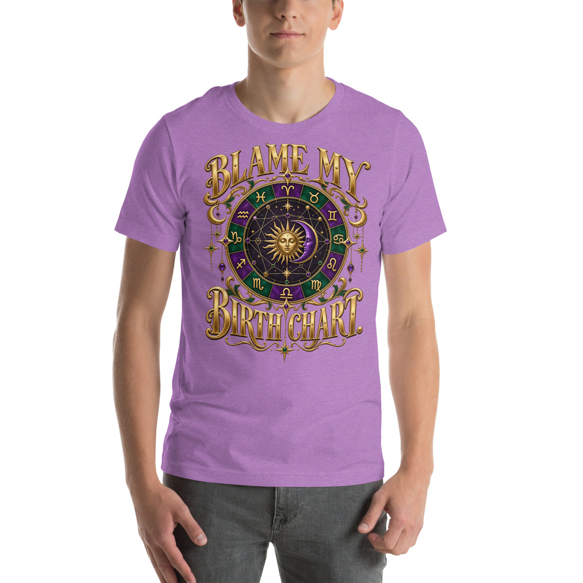 Blame My Birth Chart astrology design, a purple and green zodiac wheel with a gold sun face and crescent moon at its center, hung with gold ornaments, on a heather purple unisex t-shirt, front view