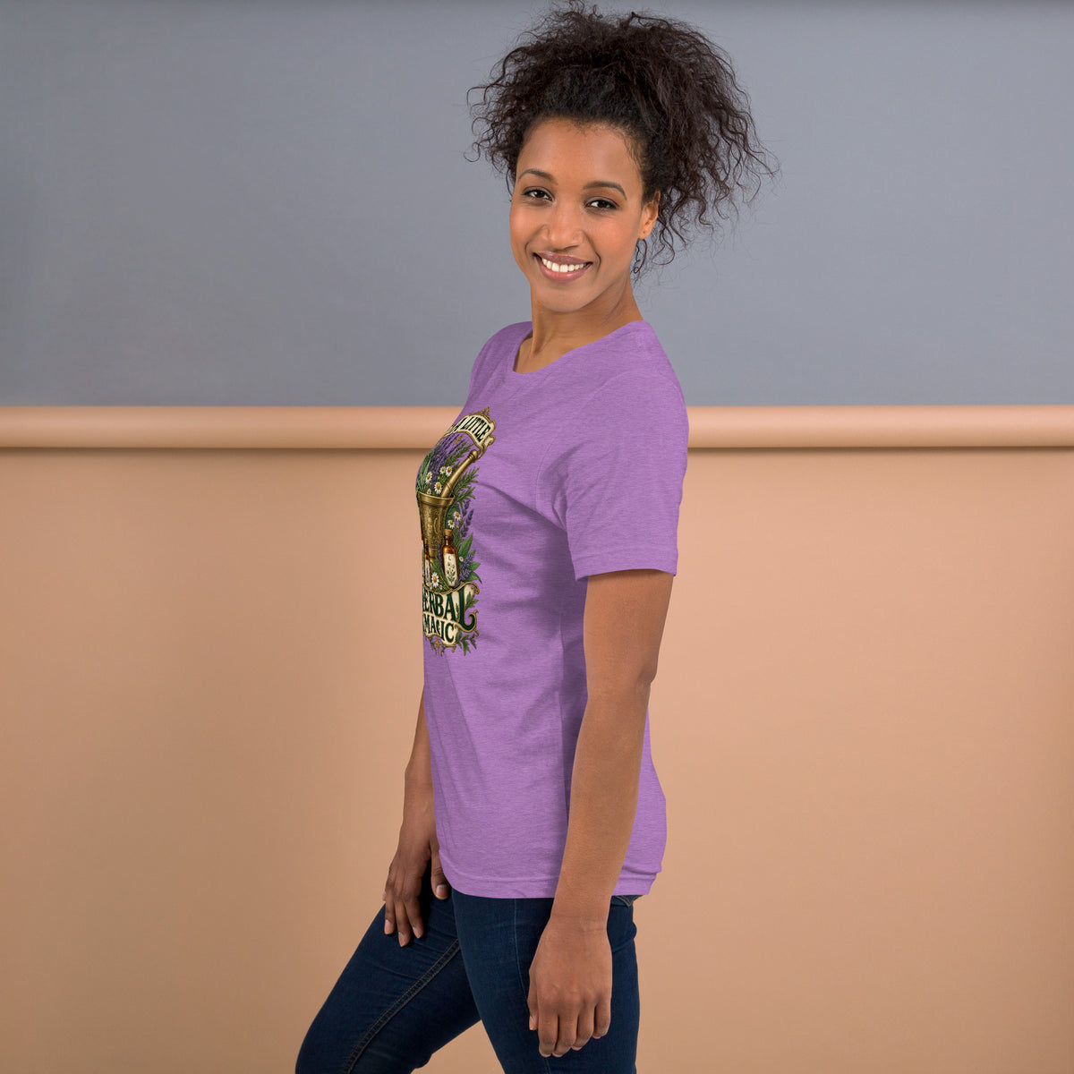 A Little Herbal Magic design, a gold mortar and pestle filled with lavender and chamomile, on a heather team purple unisex t-shirt, left side view