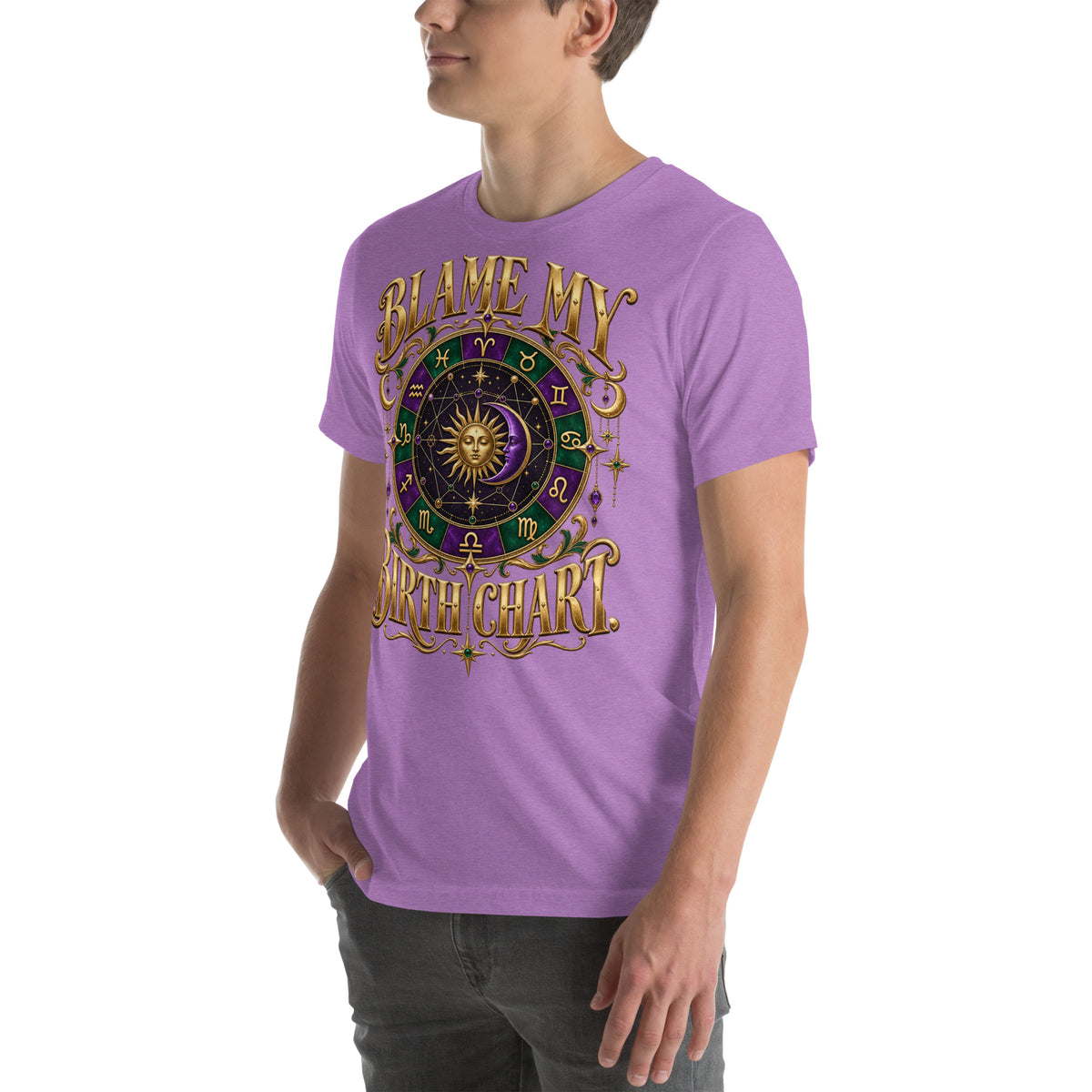 Blame My Birth Chart astrology design, a purple and green zodiac wheel with a gold sun face and crescent moon at its center, hung with gold ornaments, on a heather purple unisex t-shirt, left front view