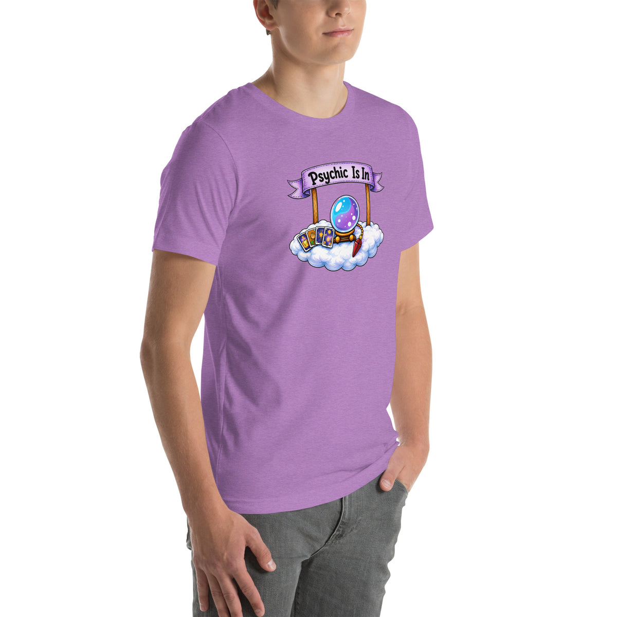 Psychic Is In design, playful floating clouds beneath a banner that reads Psychic Is Open for Business, on a heather team purple unisex t-shirt, angled right front view