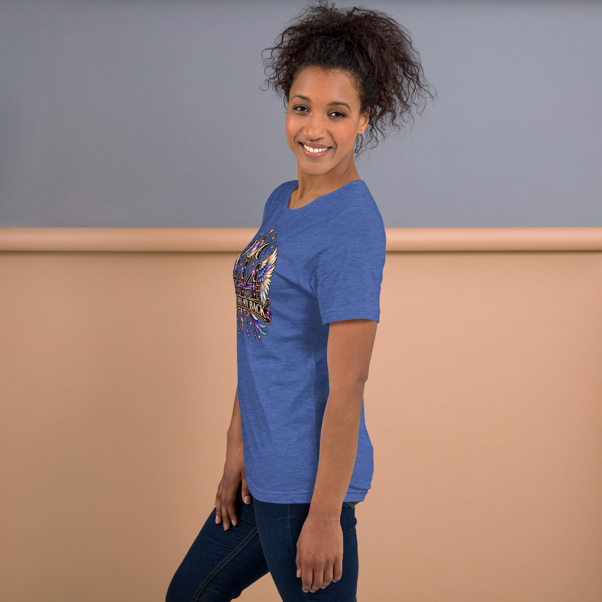 444 Spirit Has My Back angel number design, angel wings flanking the number beneath a galaxy orb and crescent moons, on a heather true royal unisex t-shirt, left side view