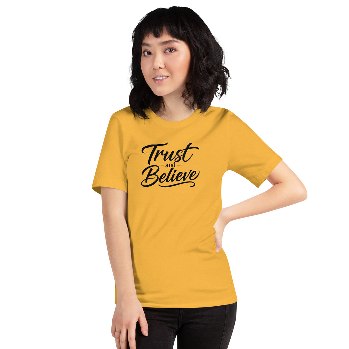 Trust and Believe design in black lettering, on a heather yellow gold unisex t-shirt, front view