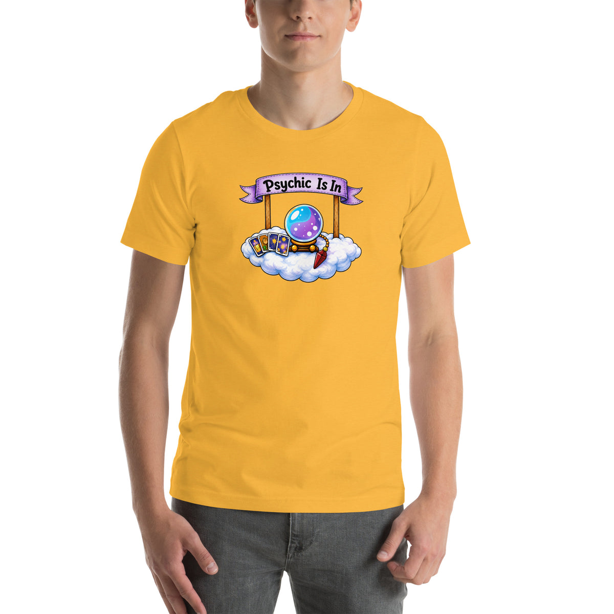 Psychic Is In design, playful floating clouds beneath a banner that reads Psychic Is Open for Business, on a heather yellow gold unisex t-shirt, front view