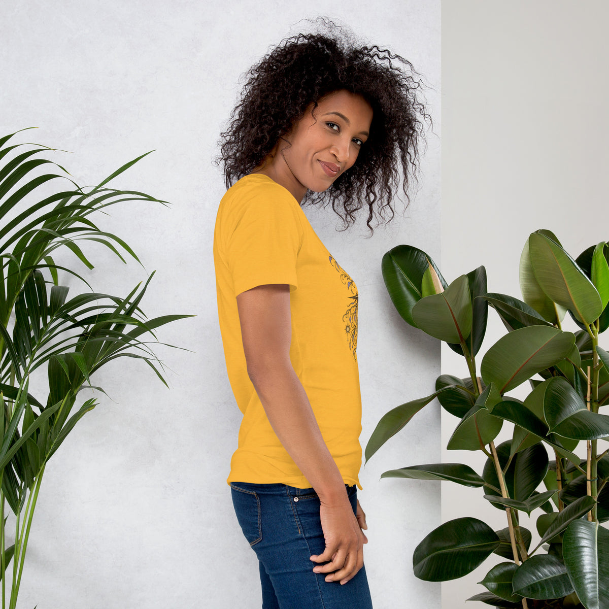 Own Your Grounded Energy design, an ornate tree with gold leaves and crystals in its roots, on a heather yellow gold unisex t-shirt, right side view