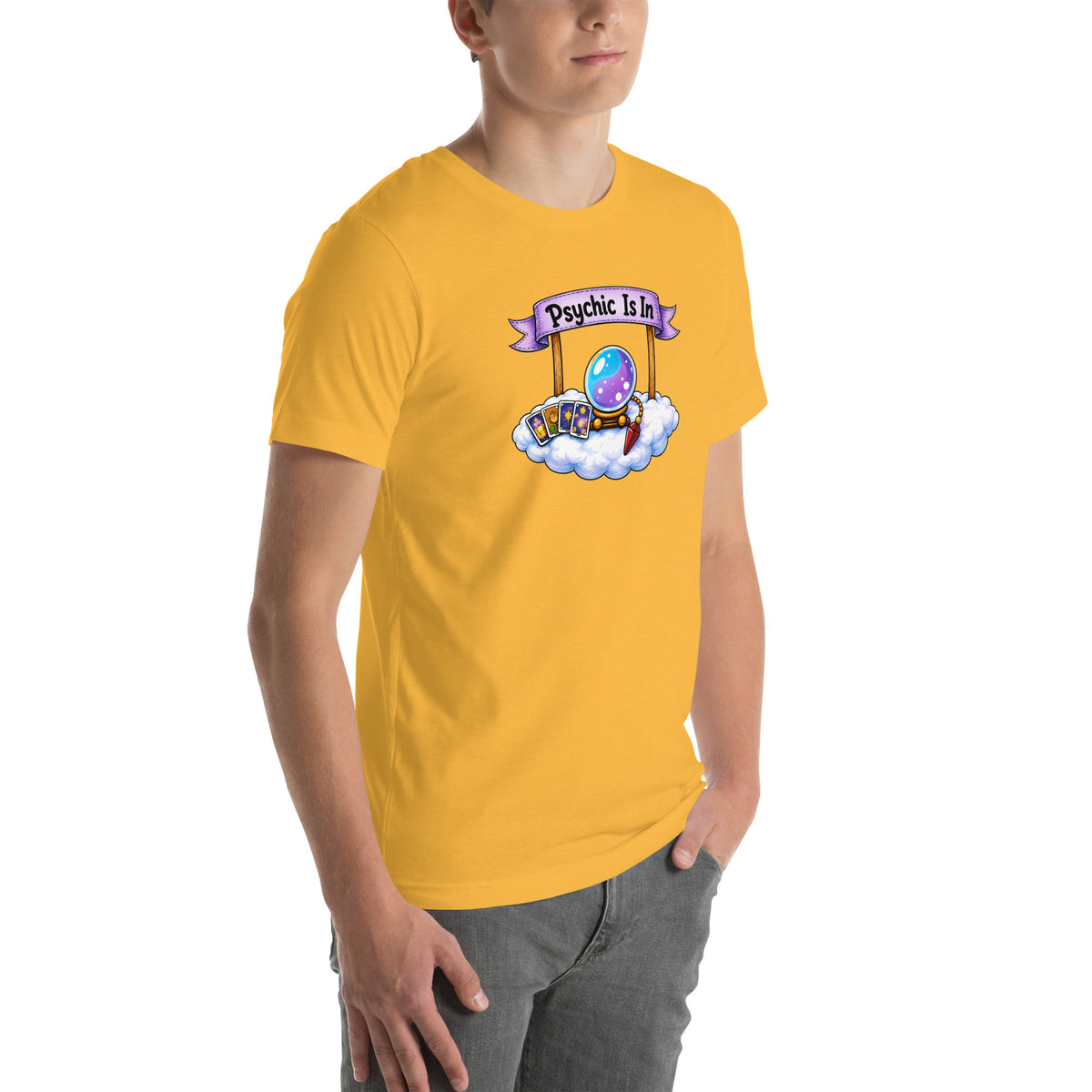 Psychic Is In design, playful floating clouds beneath a banner that reads Psychic Is Open for Business, on a heather yellow gold unisex t-shirt, angled right front view