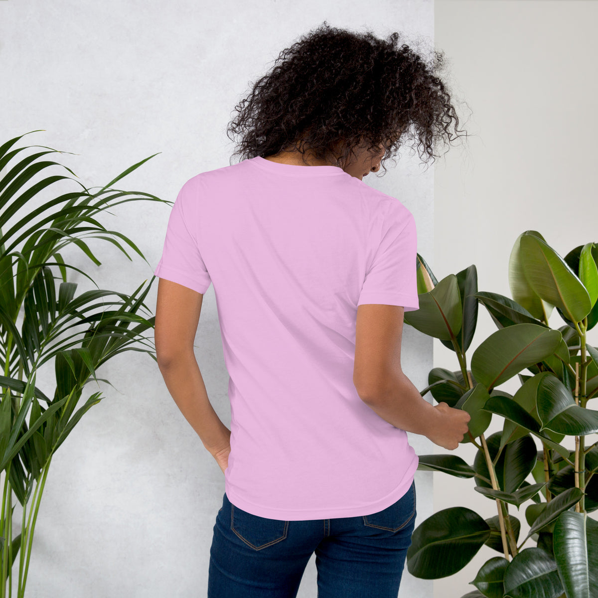 Own Your Grounded Energy design, an ornate tree with gold leaves and crystals in its roots, on a lilac unisex t-shirt, back view
