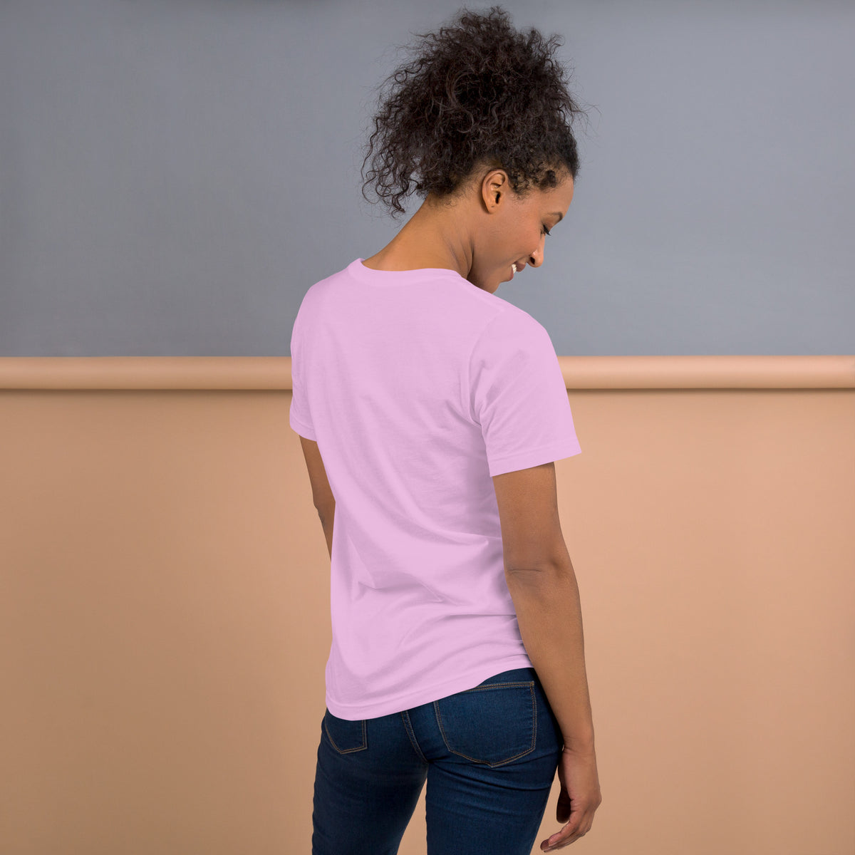 444 Spirit Has My Back angel number design, angel wings flanking the number beneath a galaxy orb and crescent moons, on a lilac unisex t-shirt, back view
